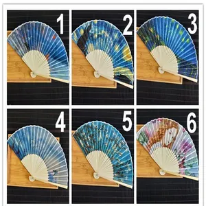 Detail view of six bamboo folding fans with famous European oil painting prints