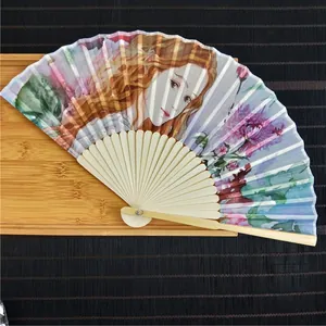 Detailed view of 21cm silk folding fan with classical European oil painting and bamboo ribs.
