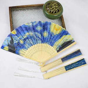 Elegant 21cm bamboo folding fan featuring Van Gogh Starry Night art print with tassel