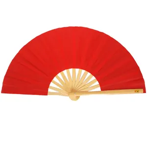 Detailed view of the 33cm red bamboo kung fu fan with a vibrant fabric surface