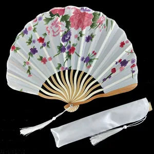 White satin folding fan with floral print and matching storage bag with tassels