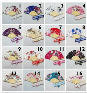 Collection of Japanese floral folding fans with decorative hollow gift boxes