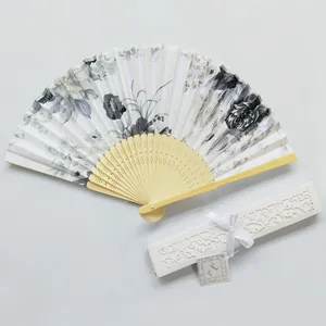Elegant Japanese style folding fan with floral print and hollow gift box.