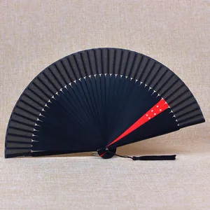 Elegant 21cm black folding fan with red accent ribs and black tassel