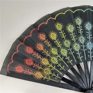 Large black folding fan featuring vibrant rainbow gradient flower patterns and bamboo ribs