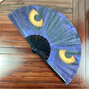 Detailed macro view of a 33cm professional bamboo Kung Fu folding fan with unique cat eyes pattern