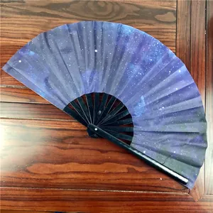 Large 33cm bamboo folding fan featuring a vibrant starry night galaxy pattern fabric