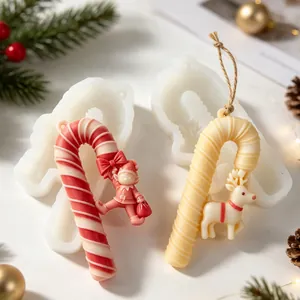 Detailed view of Christmas candy cane silicone molds and finished decorative ornaments.