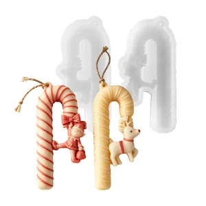 Detailed view of Christmas candy cane silicone molds with elf and reindeer designs