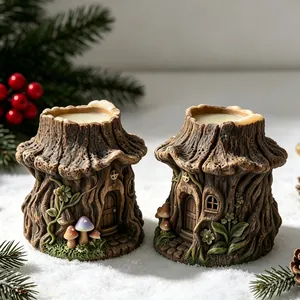 Close-up detail of rustic tree house candles made from DIY silicone molds in snow