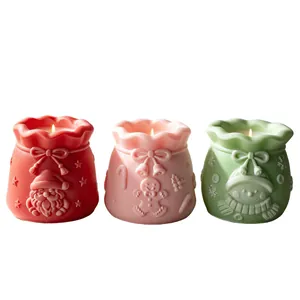 Set of three Christmas gift bag shaped silicone molds for DIY candles and plaster