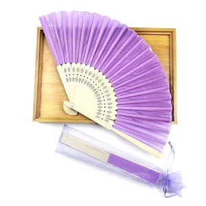 Elegant purple silk folding fan with bamboo ribs and matching organza gift bag for weddings