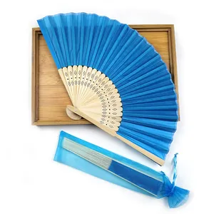 Elegant blue folding bamboo hand fan with a matching organza gift bag set for weddings