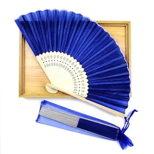 Elegant dark blue folding silk hand fan with bamboo ribs and matching organza gift bag