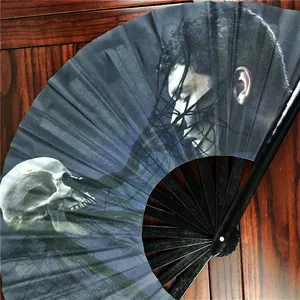 Detailed macro view of a 33cm dark artistic Kung Fu folding fan with skull design