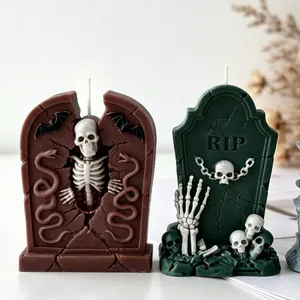 Detailed view of Halloween tombstone candles with skull and RIP engravings