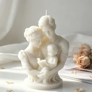 Detailed macro view of a white family of three portrait sculpture scented candle