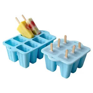 Detailed view of blue 6-cavity silicone popsicle mold with wooden sticks for home use