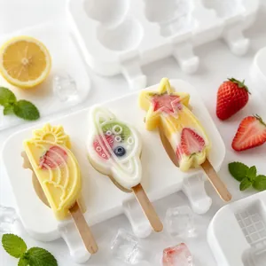 Close-up of fruit-filled space themed popsicles in a white silicone mold