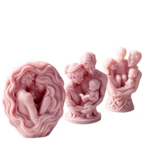 Set of three pink sculptural family and couple silicone candle molds on white background.