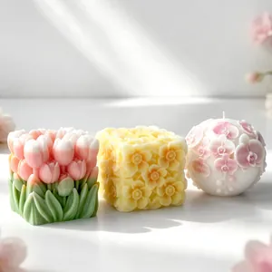 Exquisite floral aromatherapy candles in tulip, flower cube, and orchid ball designs.