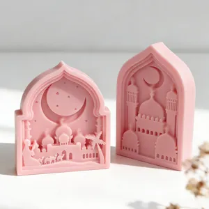 Close-up of pink silicone candle mold featuring intricate mosque and moon relief designs