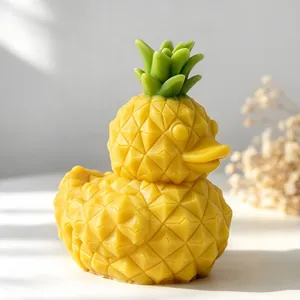 Detailed close-up view of a creative pineapple duck shaped yellow aromatherapy candle
