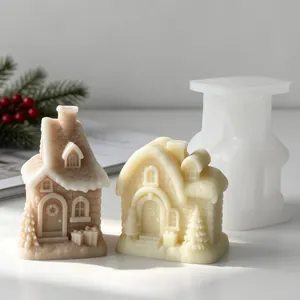 Close-up of DIY Christmas snow house silicone mold and detailed wax candle samples