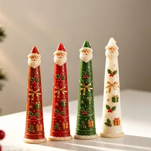 Detailed view of four elegant cone-shaped Santa Claus candles for Christmas decor