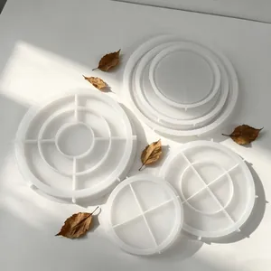 Collection of various large circular silicone tray molds for resin casting and DIY crafts.