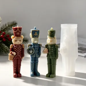 Detail view showing the translucent silicone mold and finished animal nutcracker candles