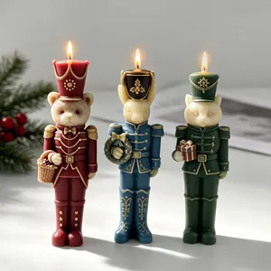 Intricate Nutcracker animal soldier candles with lit flames for Christmas decor