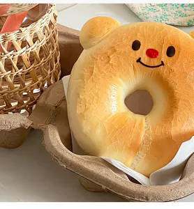 Macro view of a cute bear-shaped golden donut baked with a silicone baking mold