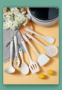 Premium 6-piece white silicone kitchen utensil set detail for non-stick cookware use