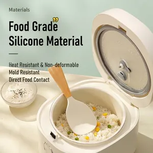 Premium food grade silicone rice spoon with wooden handle shown in a rice cooker scene