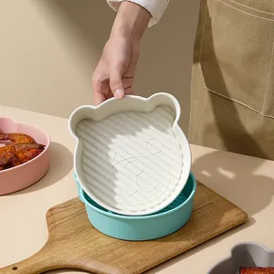 Bear-shaped silicone air fryer liner and heat-resistant baking mold for oven and cakes.