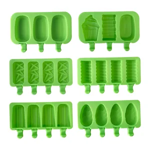 Set of 6 green silicone popsicle molds in various decorative shapes for homemade ice cream
