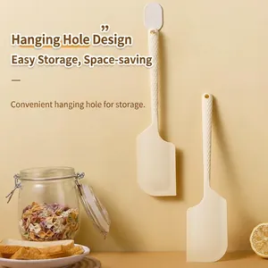 Creamy white silicone spatulas with hanging hole for easy baking storage