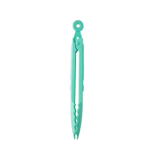 Durable mint green 9-inch plastic food tongs with wavy serrated edges and hanging loop