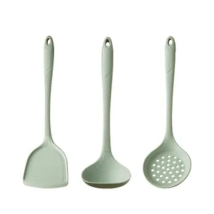 3-piece sage green silicone kitchen utensil set with spatula, ladle, and skimmer