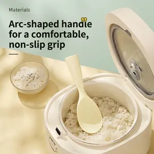 Cream non-stick stand-up rice paddle with ergonomic handle for easy serving at home