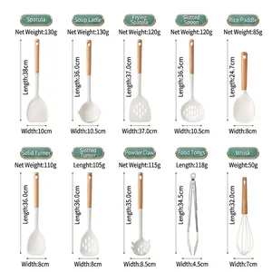 Comprehensive set of heat-resistant white silicone kitchen utensils with wooden handles