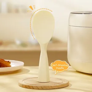 Heat resistant cream-colored standing rice paddle with non-stick surface for rice cooker