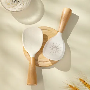 Non-stick food-grade silicone rice paddle with natural wood handle for home kitchen use