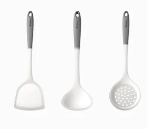 Set of food-grade silicone kitchen utensils with spatula, ladle, and skimmer.