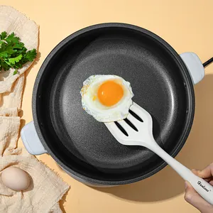 Heat-resistant white silicone slotted spatula for non-stick pans used for frying