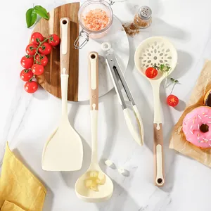 Elegant beige silicone non-stick kitchen utensil set with heat-resistant ergonomic handles