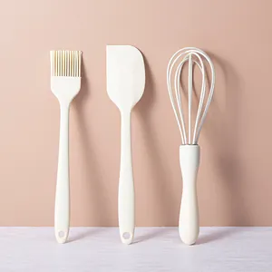 3-piece cream silicone baking tool set with whisk, spatula, and oil brush for kitchen