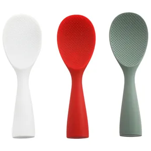 Standing non-stick silicone rice paddles in white, red and green colors
