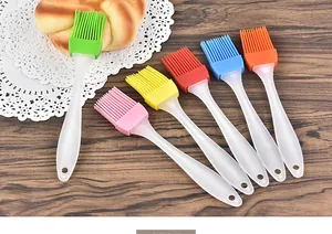 Detail view of multi-colored heat resistant silicone basting brushes for BBQ and baking